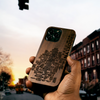 Premium wooden iPhone case engraved with iconic Brooklyn neighborhoods, perfect for those who love NYC’s urban vibe. This custom wood phone case is intricately designed, featuring detailed engravings of neighborhoods like Williamsburg, DUMBO, Brooklyn Heights, Park Slope, Greenpoint, and Bushwick, reflecting the unique culture and history of each area. Ideal for anyone who wants to carry a piece of Brooklyn with them, this case combines natural materials with modern craftsmanship